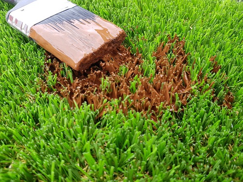 noda-rumput-sintetis